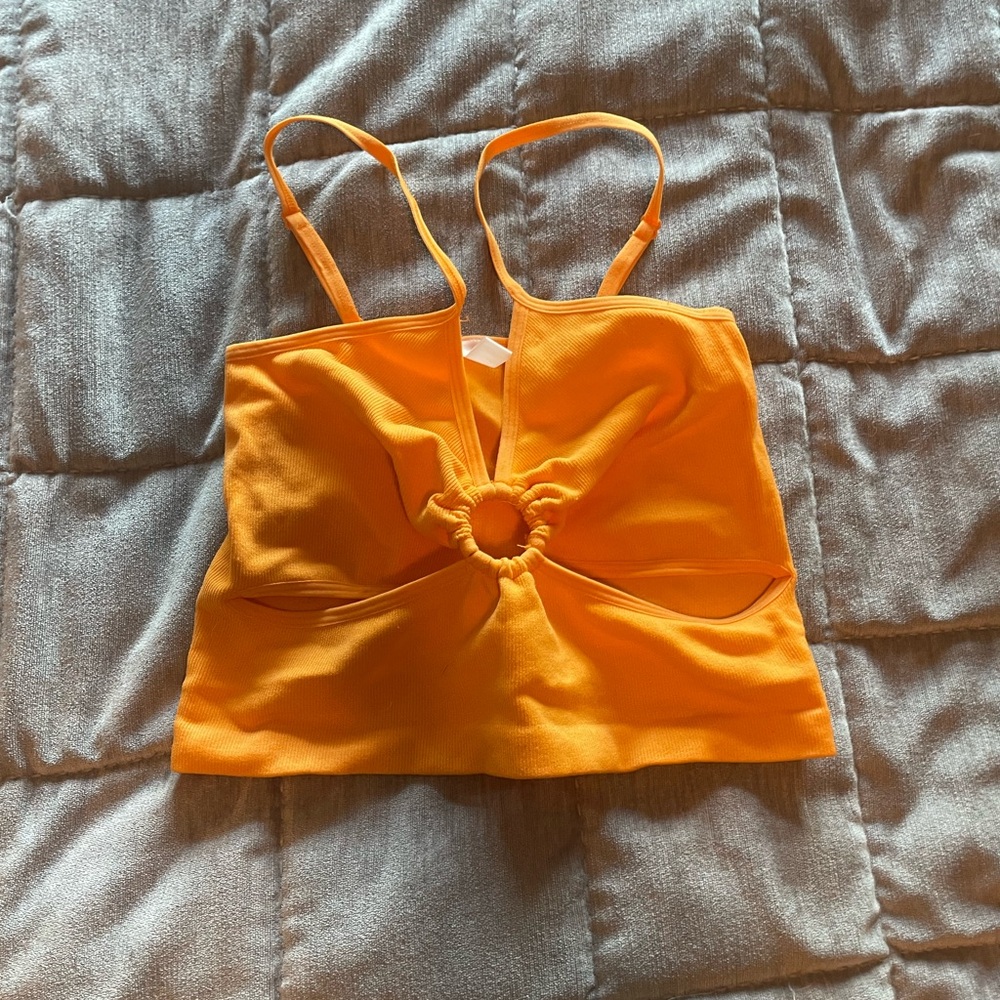 Orange crop top with cutouts perfect for summer
